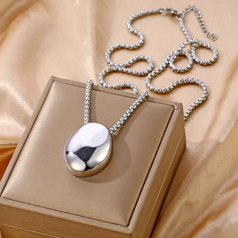 Article tendance style européen/américain – Best-seller international Collier long et épuré haut de gamme pour femme avec pendentif ovale – Vente en gros de bijoux de Qingdao