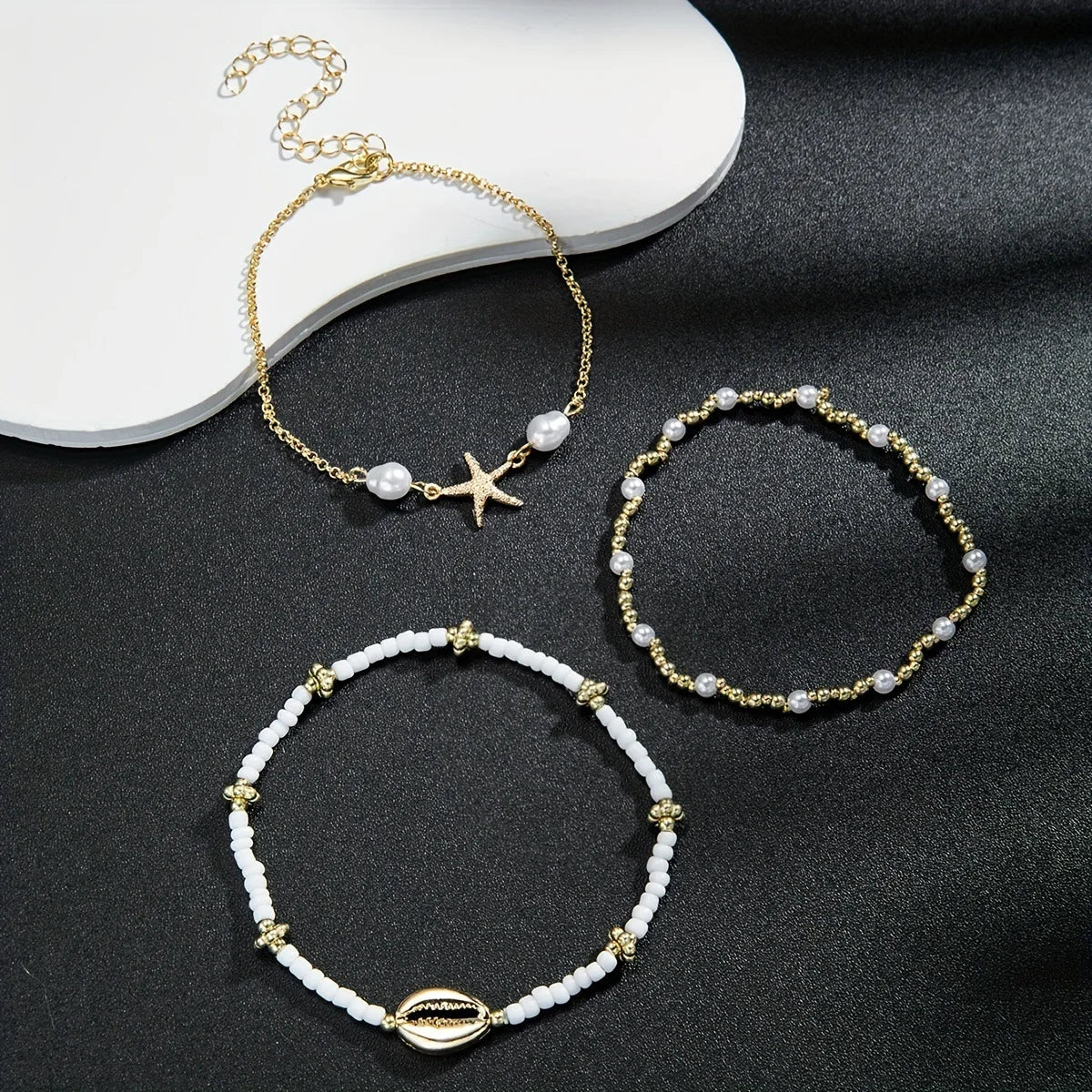 Chaînes de cheville de Style bohème pour femmes, accessoires de pied à trois couches avec perles de riz, coquillages et étoile de mer
