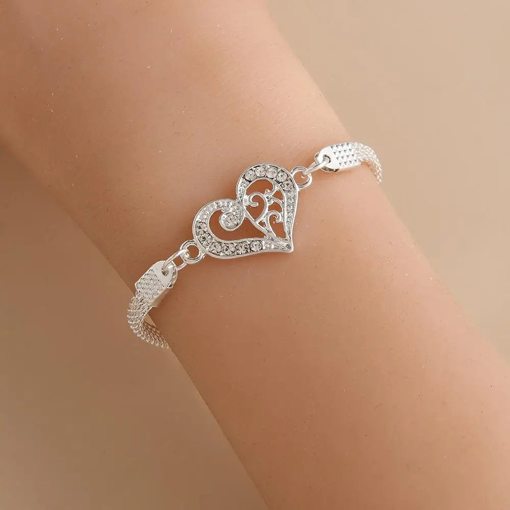Le nouveau bracelet croisé pour femmes, mode, luxe léger, tempérament, design de niche, bracelet de sensibilité senior, cadeaux