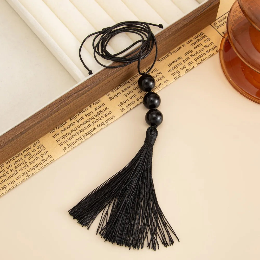 Collier Long avec pendentif pompon perlé en acrylique noir pour femmes, créatif, à la mode, fil de cire réglable, chaîne de pull, bijoux cadeaux