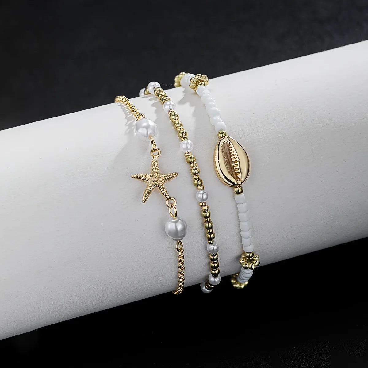 Chaînes de cheville de Style bohème pour femmes, accessoires de pied à trois couches avec perles de riz, coquillages et étoile de mer
